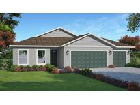 Two-car garage home with landscaping at 2297 Longworthy Rd, North Port, FL 34288