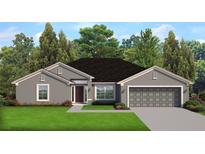 One-story home with gray siding and two-car garage at 22049 Deborah Ave, Port Charlotte, FL 33954