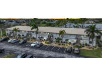 Multi-unit building with ample parking at 26485 Rampart Blvd # D28, Punta Gorda, FL 33983