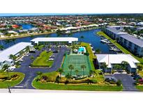 Aerial view highlighting building location and tennis court at 3600 Bal Harbor Blvd # 2-O, Punta Gorda, FL 33950