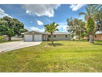 Newly renovated house with a two-car garage at 21507 Beaverton Ave, Port Charlotte, FL 33952