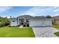 Two-story home with three car garage at 9978 Audrey St, Port Charlotte, FL 33981