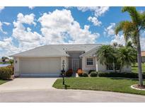 Charming single-story home with two-car garage and landscaped yard at 24304 Keldholme Ct, Punta Gorda, FL 33980