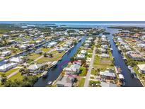 Waterfront home with boat dock and stunning canal access to Gulf of Mexico at 24313 Pirate Harbor Blvd, Punta Gorda, FL 33955
