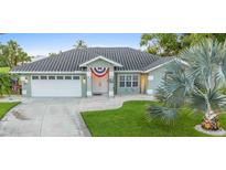 Charming single-Gathering home with a well-maintained lawn at 5001 Richmond Ter, North Port, FL 34287