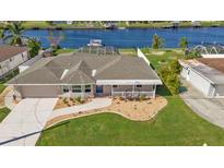 Single-Gathering home with canal view at 806 Ellicott Nw Cir, Port Charlotte, FL 33952