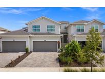 Modern two-story home with attached garage and attractive landscaping at 15903 Grassland Ln # 4421, Punta Gorda, FL 33982