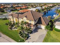 Aerial view of luxurious waterfront home at 1209 San Mateo Dr, Punta Gorda, FL 33950