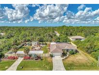 Single-Gathering home with large backyard and detached shed at 2291 Meetze St, Port Charlotte, FL 33953