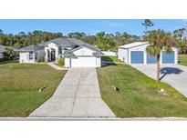 House and detached garage, ample parking at 17152 Wintergarden Ave, Port Charlotte, FL 33948