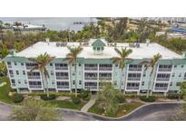 Coastal three-story building with balconies and waterfront views at 5115 Melbourne St # A206, Punta Gorda, FL 33980