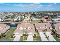 Aerial view of canal front property, showcasing a villa and community at 3800 Bal Harbor Blvd # 312, Punta Gorda, FL 33950
