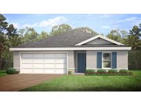 One-story home with gray siding, two-car garage, and landscaped lawn at 12506 Gallagher Blvd, Port Charlotte, FL 33981