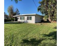 Newly renovated single story home with carport and spacious yard at 1742 Mangoe St, Punta Gorda, FL 33980