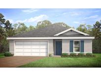 Single-story home with a two-car garage and landscaped lawn at 860 Chevy Chase St, Port Charlotte, FL 33948