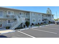 Well maintained building exterior with parking at 3310 Loveland Blvd # 1408, Port Charlotte, FL 33980