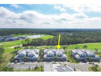 Aerial view of a townhome community with golf course views at 14672 Sycamore Ct # 3622, Punta Gorda, FL 33955