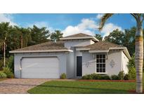 Single-story home with a two-car garage and attractive landscaping at 16098 Highgate St, Port Charlotte, FL 33953