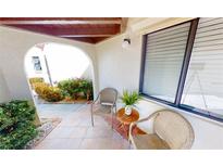 Charming patio with beautiful plants and seating perfect for relaxing outdoors at 3830 Bal Harbor Blvd # 5, Punta Gorda, FL 33950