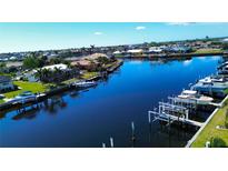Waterfront homes with private docks line the canal in this stunning aerial view at 2601 W Marion Ave # 45C, Punta Gorda, FL 33950