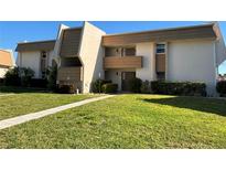 Inviting condo with well-manicured lawn and landscaping at 1080 Bal Harbor Blvd # 4D, Punta Gorda, FL 33950