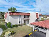 Attractive condo with red tile roof and covered parking at 311 Garvin St # 401C, Punta Gorda, FL 33950