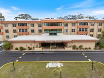 Well maintained condo building, Chelsea House, with manicured lawns and inviting entrance at 2290 Aaron St # 312, Port Charlotte, FL 33952