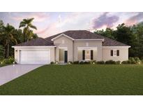 Charming single-story home featuring a two-car garage, a manicured lawn, and tasteful landscaping at 26334 Bridgewater Rd, Punta Gorda, FL 33983