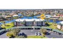 Waterfront condo with canal views, covered parking, and easy access to community amenities at 601 Shreve St # 36C, Punta Gorda, FL 33950