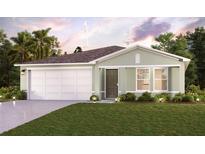 Charming single-story home with a two-car garage, well-maintained lawn, and inviting curb appeal at 5581 Bannock Cir, North Port, FL 34288
