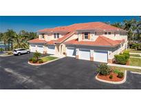 Attractive condo complex with red tile roofs, well manicured landscaping and attached garages at 240 West End Dr # 622, Punta Gorda, FL 33950