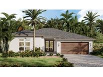 Charming single-story home with a two-car garage, neutral color palette, tropical landscaping, and inviting entrance at 489 Guild St, Port Charlotte, FL 33954