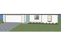 Charming single-story home featuring a two-car garage, a bright blue door, and a well-maintained lawn at 4453 Lagoon Ter, North Port, FL 34286