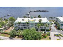 Stunning waterfront condo with lush landscaping, private boat docks, and beautiful water views at 5114 Melbourne St # A202, Punta Gorda, FL 33980