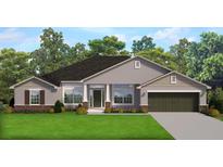Charming single-story home featuring a well-manicured lawn, neutral color palette, and attached two-car garage at 337 Rosario St, Punta Gorda, FL 33983