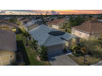 Charming single-story home with well-maintained landscaping and an attached two-car garage at 24317 Kintail Ct, Punta Gorda, FL 33980