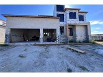 New construction, block home with a two car garage and modern design elements awaiting personalization at 234 Bangsberg Se Rd, Port Charlotte, FL 33952