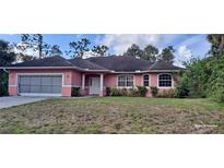 Charming one-story home with a well-manicured lawn and inviting curb appeal at 2585 Yuma Ave, North Port, FL 34286