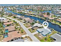 Beautiful aerial view of a waterfront home with direct access to a canal and the Gulf of Mexico at 732 Santa Margerita Ln, Punta Gorda, FL 33950