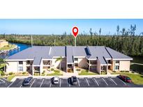 A well maintained building with parking, landscaping and canal access at 3256 White Ibis Ct # 24A, Punta Gorda, FL 33950
