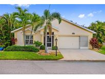 Charming single-Gathering home with mature palm trees and a well-manicured lawn in a desirable neighborhood at 1812 Birmingham Blvd, Punta Gorda, FL 33980