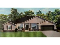 Charming single-story home featuring a two-car garage, landscaped yard, and a welcoming front porch at 9469 Spring Cir, Port Charlotte, FL 33981