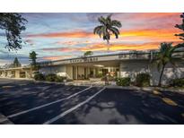 The Essex House features a well maintained entrance with beautiful landscaping and ample parking at 2437 Harbor Blvd # 114, Port Charlotte, FL 33952