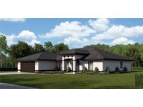 One-story home with a 3-car garage, and attractive landscaping at 12073 Van Loon Rd, Port Charlotte, FL 33981