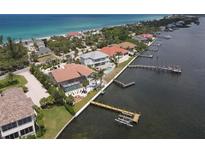 Luxury waterfront home with private pool and dock, offering breathtaking ocean and canal views at 8035 Manasota Key Rd, Englewood, FL 34223