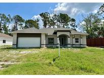 Newly constructed one-story home with garage at 5462 Gagnon Ter, North Port, FL 34291