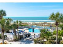 Inviting pool area with beach access and lounge chairs at 7536 Palm Island S Dr # 1524, Placida, FL 33946