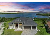 Luxury waterfront home with a two-car garage, large lot and private dock at 16147 Lankford Ct, Port Charlotte, FL 33981