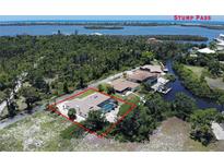 Waterfront property with private pool and easy access to Stump Pass and Gulf waters at 3440 Downing W St, Englewood, FL 34224