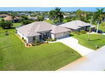 Single-Gathering home with a large backyard and driveway at 283 Long Meadow Ln, Rotonda West, FL 33947